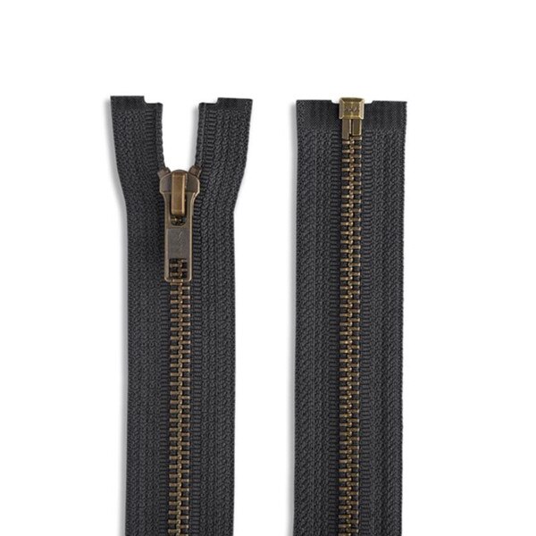 Black fabric and antique brass one-way separating, open-end zippers are ideal for use on jackets.